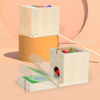 Montessori-Box mit Formen und Farben und Bällen