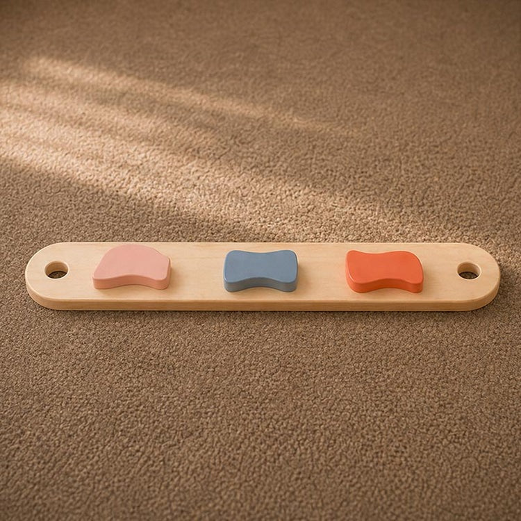 Montessori-Balancebalken und -Steine