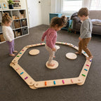 Montessori-Balancebalken und -Steine