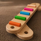 Montessori-Balancebalken und -Steine